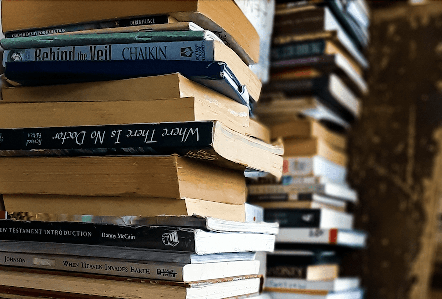 Decluttering Your Home – Our Top Tips: pile of books